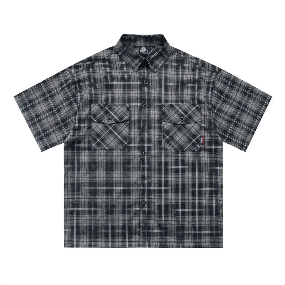 Black and gray embroidered plaid short sleeve button-up shirt with two chest pockets.