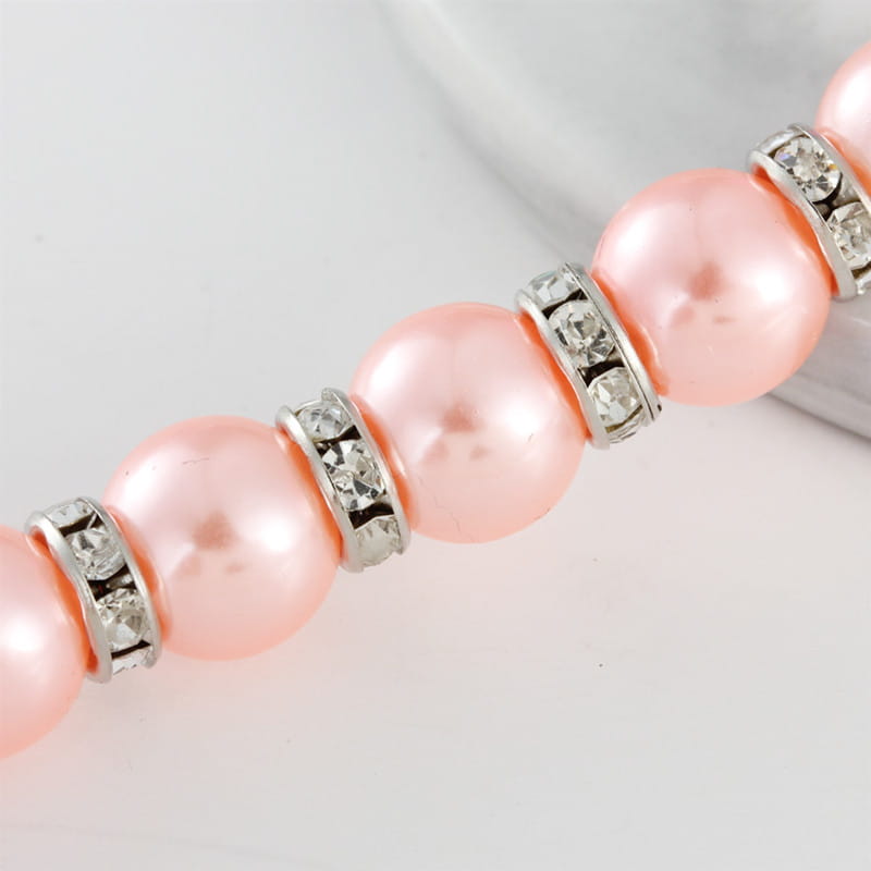collier de perles pour animal à ruban pastel délicat de couleur rose, orné de perles d’espacement à finition argentée, agrémentées de strass transparents.