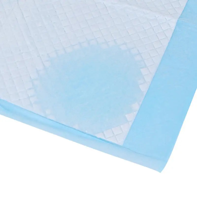 gray textured thickening absorbent dog pee pads in black and yellow package with white dog image for pet training mats.