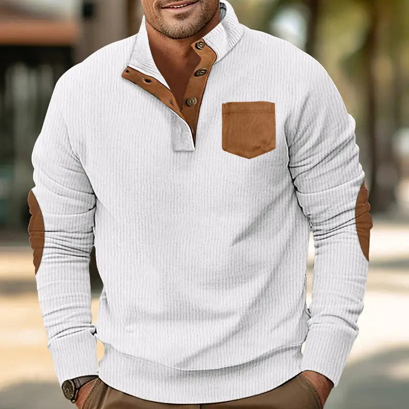 White ribbed long sleeve slim fit corduroy patchwork pullover with brown leather collar, buttons, chest pocket, and elbow patches featuring contrast accents.