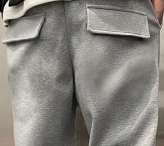 men’s gray fleece drawstring sweatpants with two front pockets made of soft fleece material