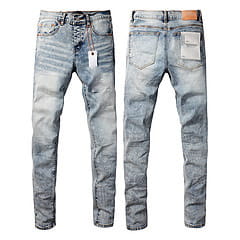 Men’s distressed slim fit patchwork denim jeans in light-wash denim with a slim-fit cut and subtle fading details.
