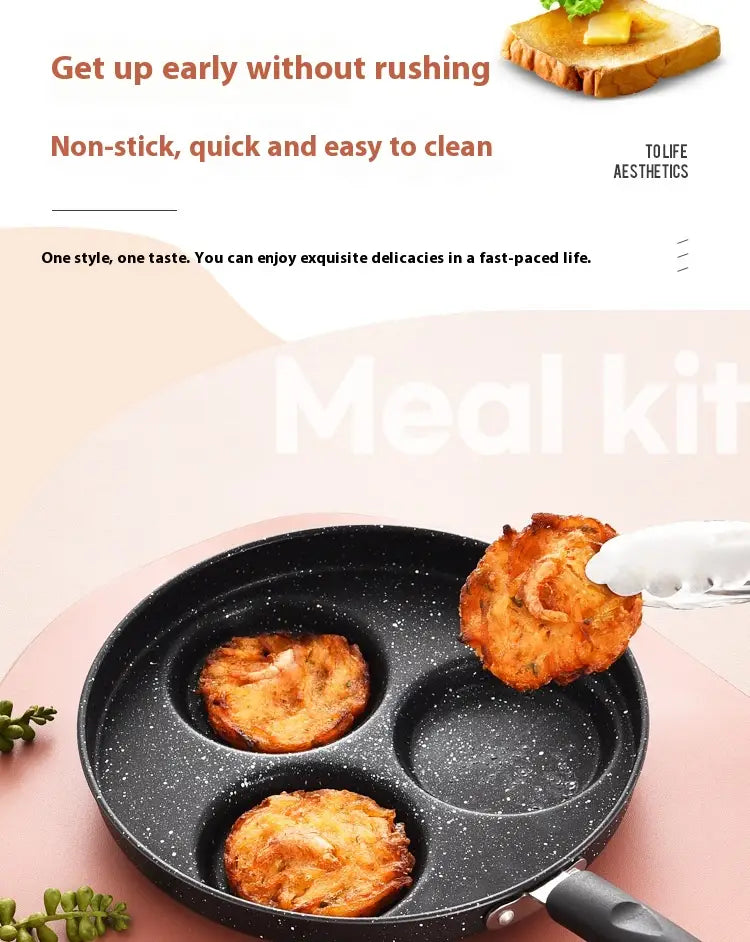 Black speckled non-stick heart pancake pan 25cm with three portions and black handle made of medical stone material.