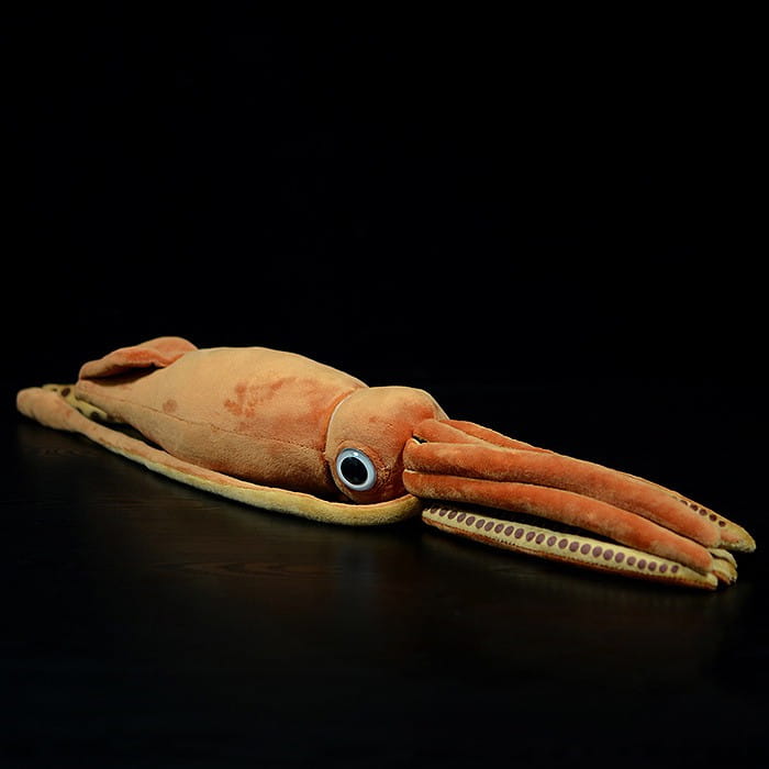 A plush orange squid stuffed animal toy measuring 32cm with a soft velvety texture and detailed eyes.
