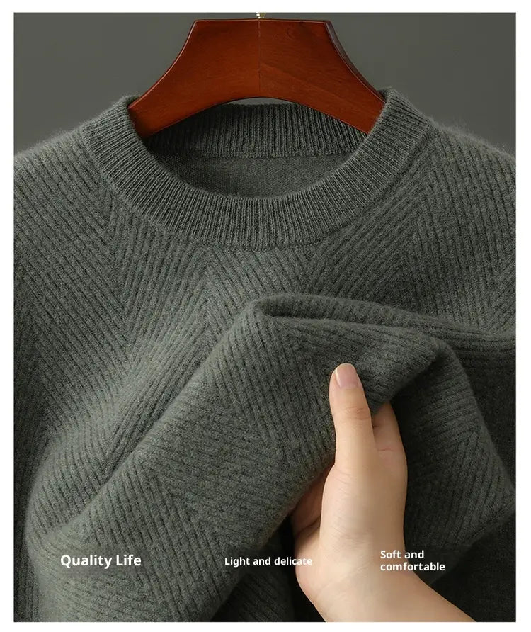 A soft dark gray knitted cashmere pullover sweater for men featuring a ribbed crew neck and herringbone pattern.