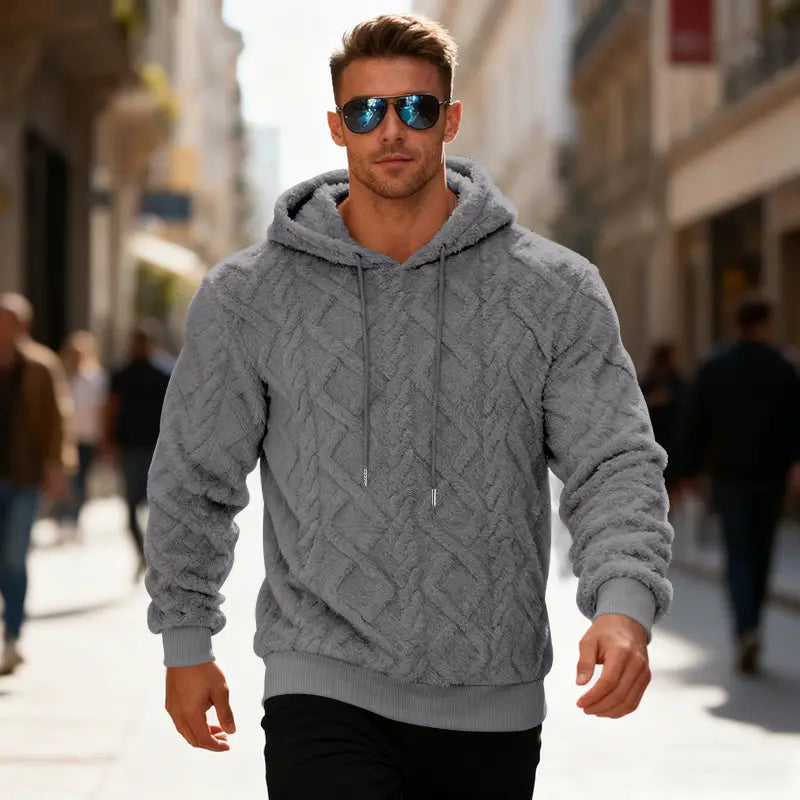 Gray men’s textured fleece lined knit hoodie featuring a cable-knit pattern with drawstrings and ribbed cuffs.