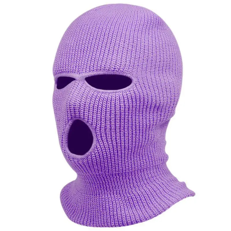 Bonnet cagoule tricoté violet vibrant, avec des ouvertures pour les yeux et la bouche, conçu comme un masque chaud pour le cyclisme.