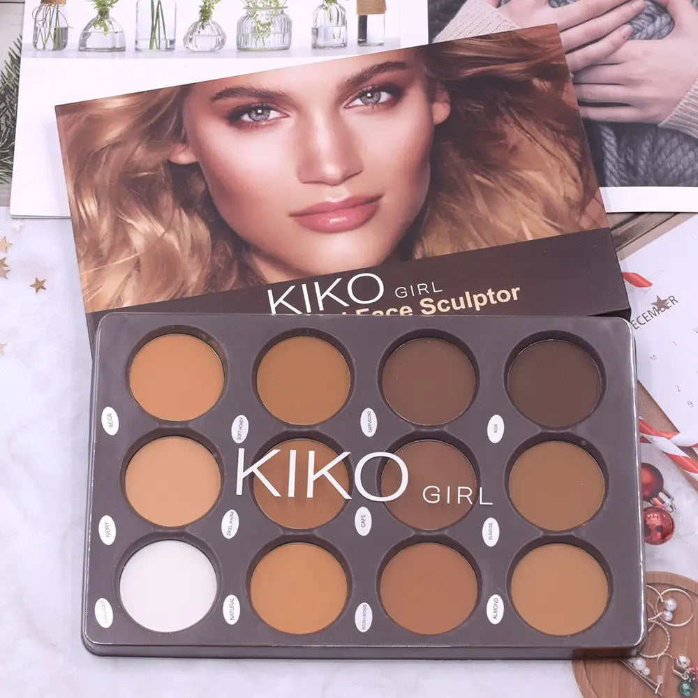 Kiko 12 color contour palette matte face sculptor powder with twelve circular pans of contouring shades in various browns and one white housed in a sleek dark brown case.