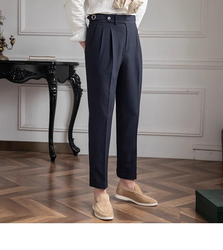 Dark navy slim fit pleated summer linen suit trousers with tailored fit and belt loop detail.