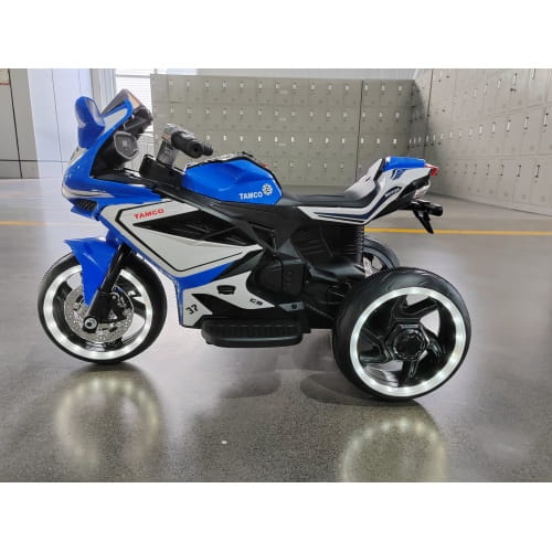 Blue and white Tamco electric tricycle motorcycle with black accents designed as a 6v kids electric ride on motorcycle in red.
