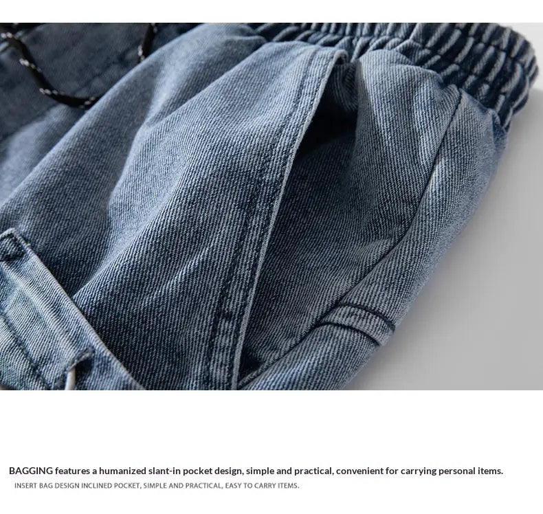 cargo denim shorts light wash streetwear featuring blue denim material with an elastic waistband and slant-in pocket design.