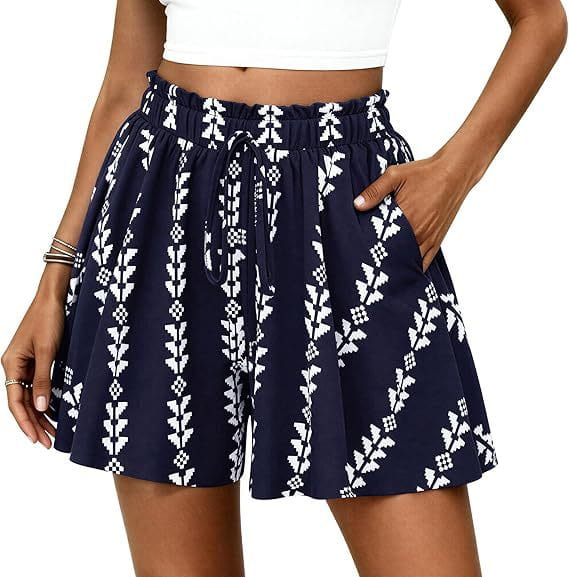 Marineblaue Shorts mit floralen Mustern und hoher Taille im A-Linien-Schnitt mit weißem geometrischem Tribal-Muster und elastischem Bund.