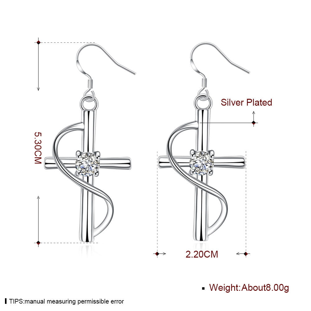 Elegant silver swirling gemstone cross earrings with a central clear gemstone and a silver-plated swirling design