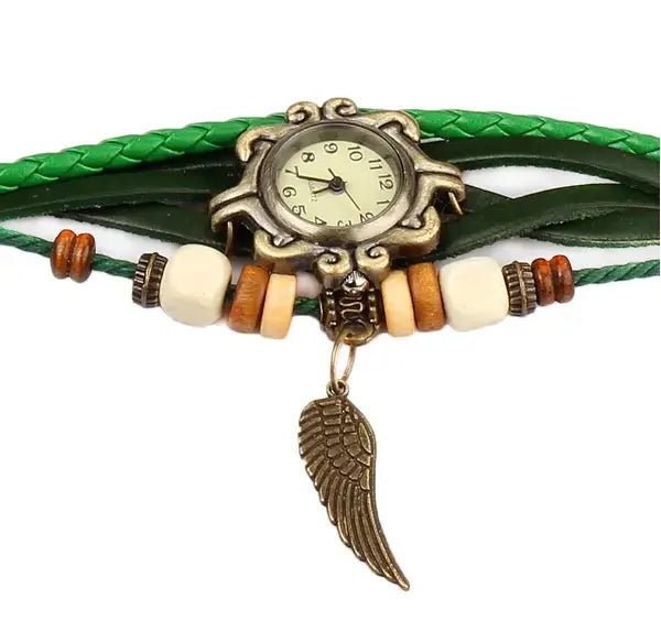 Bohemian green braided leather angel wing watch with antique brass finish sunburst dial and wooden cream colored beads.