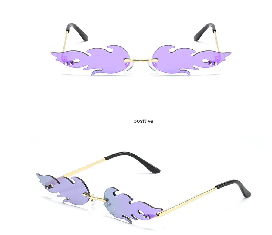 Metallic flame gemstone sunglasses featuring purple flame-shaped gradient lenses with gold-toned metal frames and black temple tips.