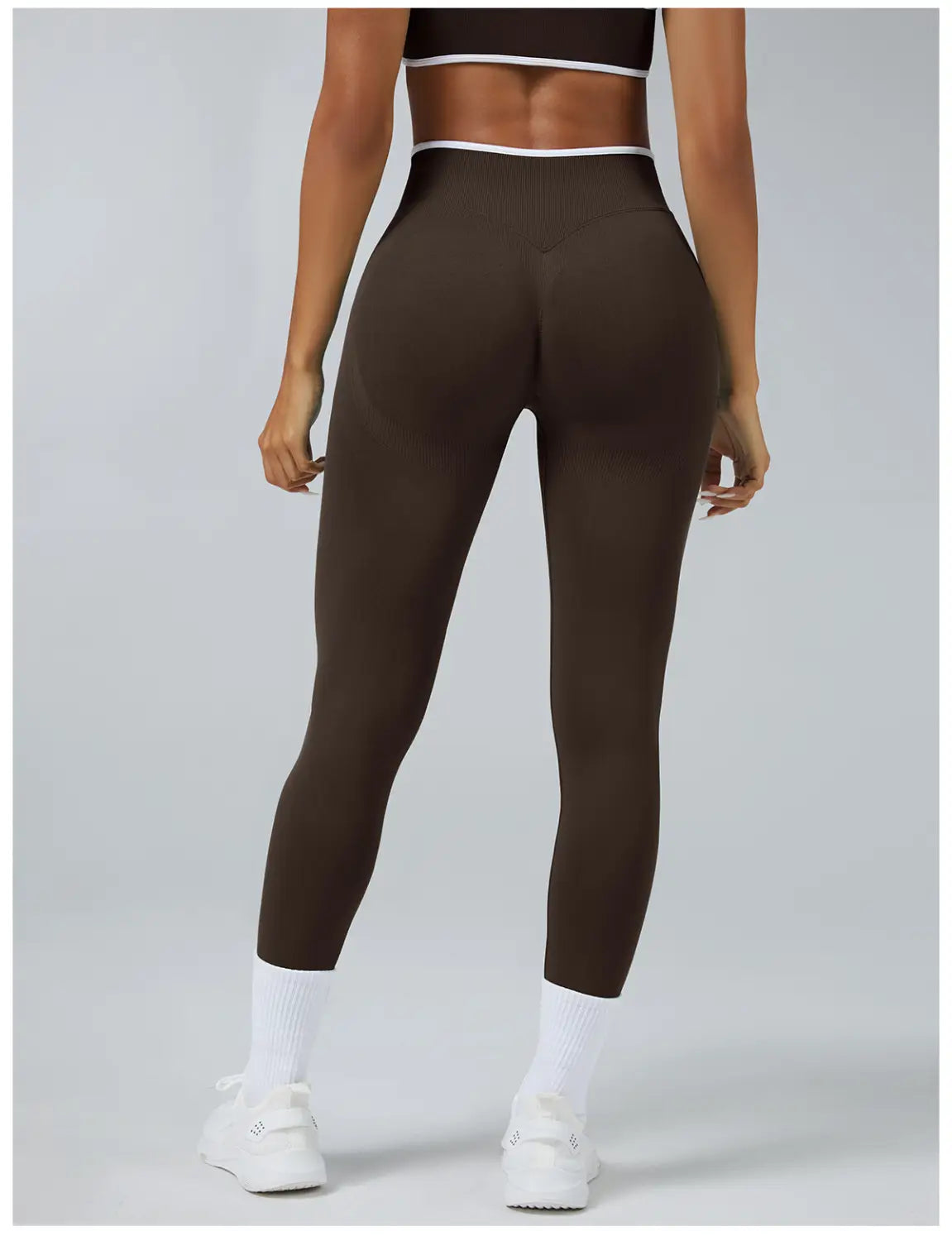 Brown seamless high waist sports yoga leggings with white trim at the waistband.