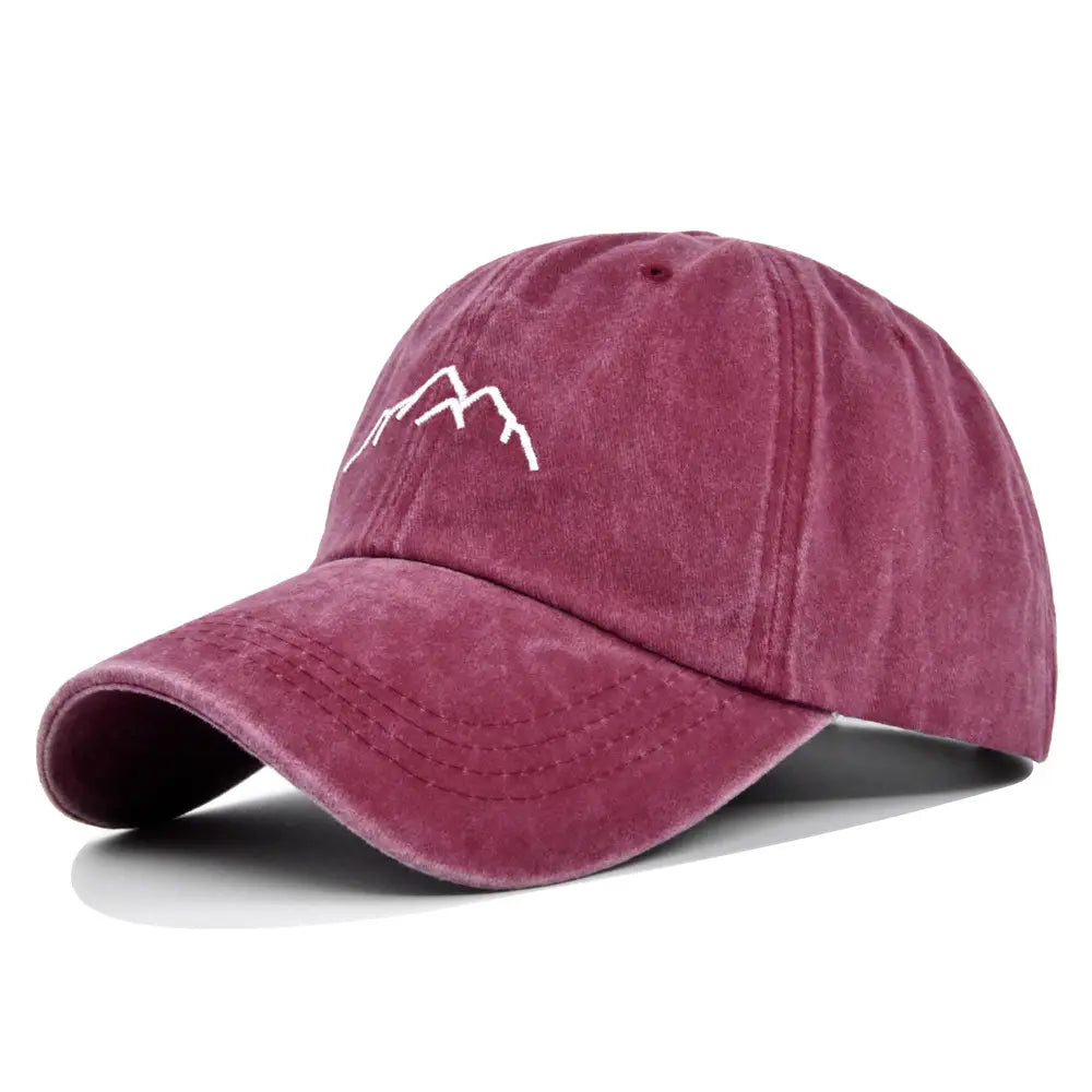 Maroon distressed cotton baseball cap featuring a white embroidered mountain design titled embroidered mountain baseball cap.