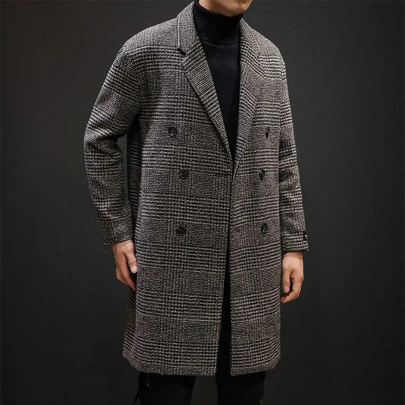 A men houndstooth wool double breasted overcoat in classic black and white herringbone pattern crafted from textured wool blend fabric.