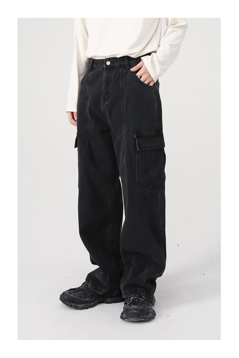 black relaxed fit cargo pants with multiple pockets made of denim featuring a retro loose fit wide leg design