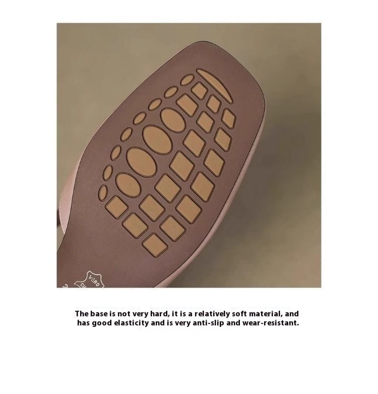 The brown rubber sole of the bow closed toe leather mule flats for women features a pattern of raised oval and square grips.
