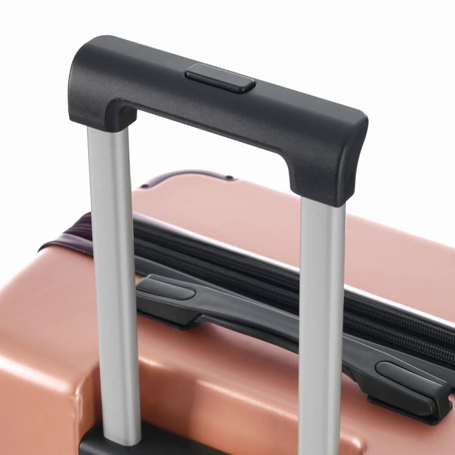 Rose gold 28 inch expandable hardshell spinner suitcase with a black and silver telescoping handle shown from the back side.