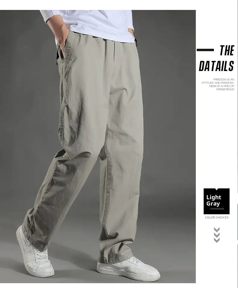 Men’s Japanese style cotton light gray cargo pants with a relaxed fit and multiple pockets designed for workwear.