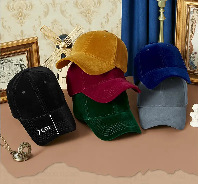 A collection of five men suede baseball caps in mustard yellow deep red forest green royal blue and charcoal gray featuring thickened velvet material suitable for winter use.