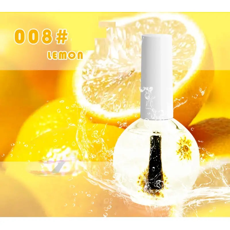 Clear lemon-scented dried flower revitalizing nail and cuticle treatment oil with yellow flower petals in a transparent bottle and white cap.