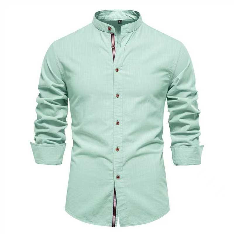 A light mint green men’s slim fit linen blend shirt with long sleeves, a mandarin collar, and subtle striped trim along the placket.