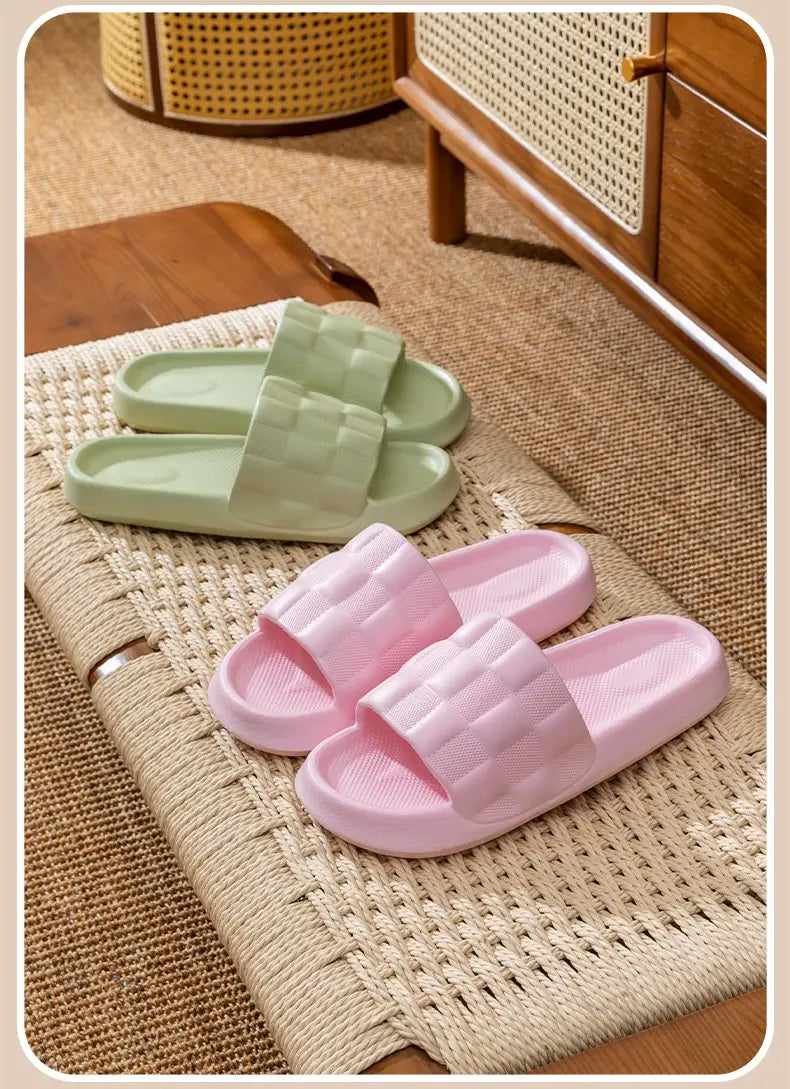 Pink and mint green quilted EVA soft sole breathable slide sandals with a quilted strap design.
