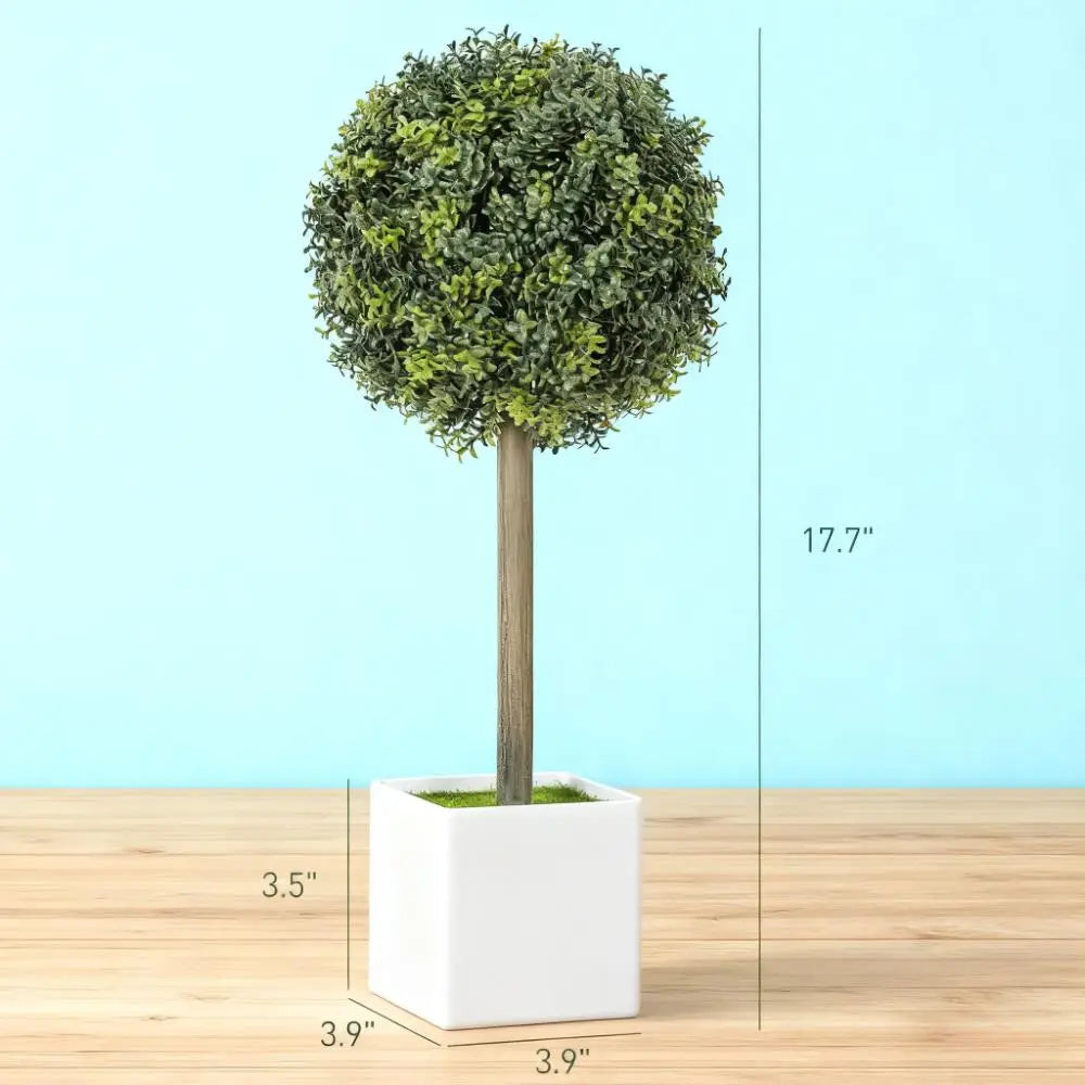 eine Buchsbaum-Topiary-Kugel mit dichtem grünem Laub und einem schlanken Holzstiel in einem eleganten weißen quadratischen Topf, Teil eines Sets aus 2 mit weißen Töpfen.