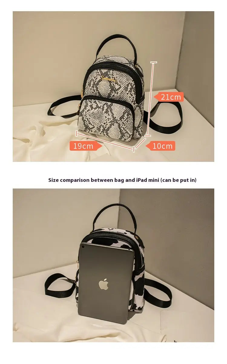 a compact black and white snake-print mini backpack with adjustable straps in korean style suitable for everyday use