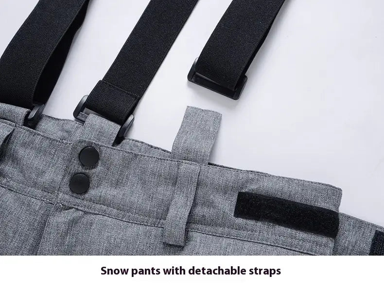 Men waterproof thermal snow pants in gray featuring detachable black elastic straps and black plastic buckles for secure fit and enhanced comfort.