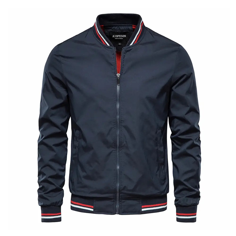 Men’s dark navy bomber jacket casual zip outerwear featuring red white and black striped trim on the collar cuffs and waistband.
