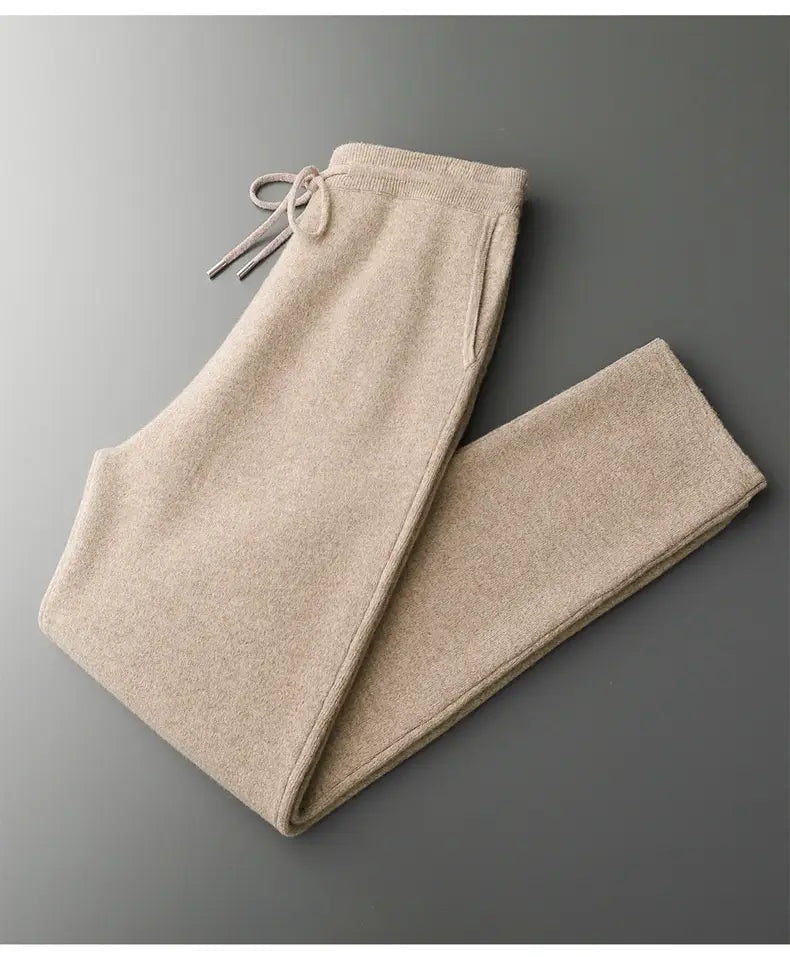 beige knit wool joggers with a drawstring waistband and subtle texture as part of men wool cardigan sweatsuit.