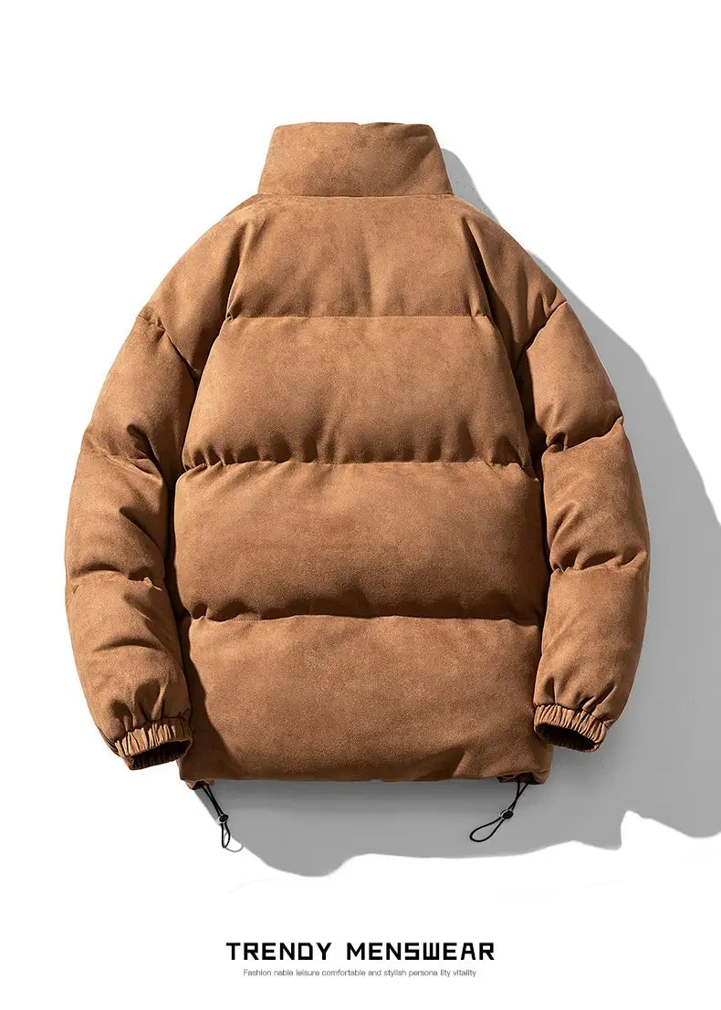 Brown suede puffer jacket for women with thick padding, horizontal quilted panels, and elastic cuffs designed for winter wear.