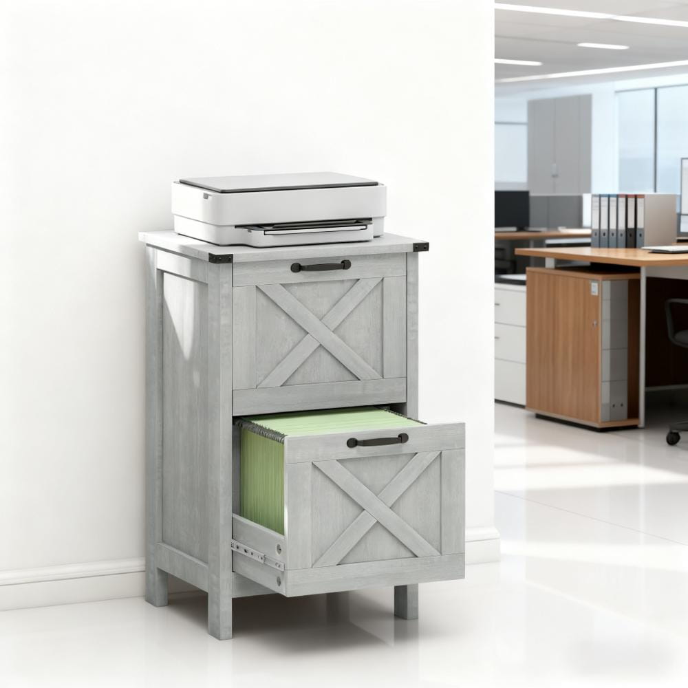 Gray farmhouse-style two-drawer file cabinet with x-shaped paneling and black metal handles used as a printer stand.