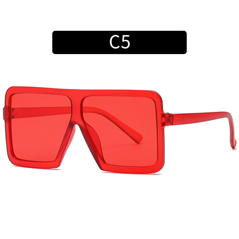 Oversized square translucent uv400 fashion sunglasses feature a vibrant red plastic frame and matching lenses.