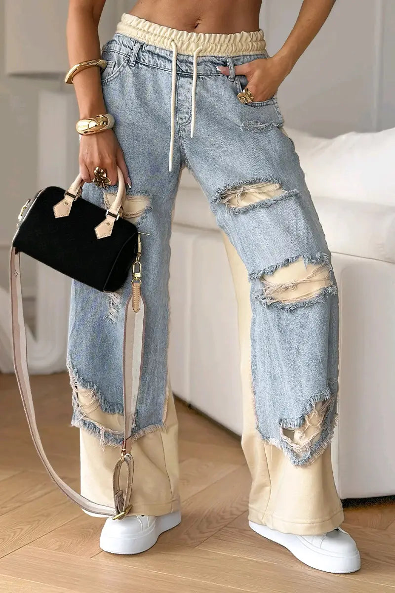 Hellwaschende Denim-Ripped-Jeans mit beigen Einsätzen und Kordelzug-Bund aus kontrastgesteppten Denim-Streetwear-Jeans.