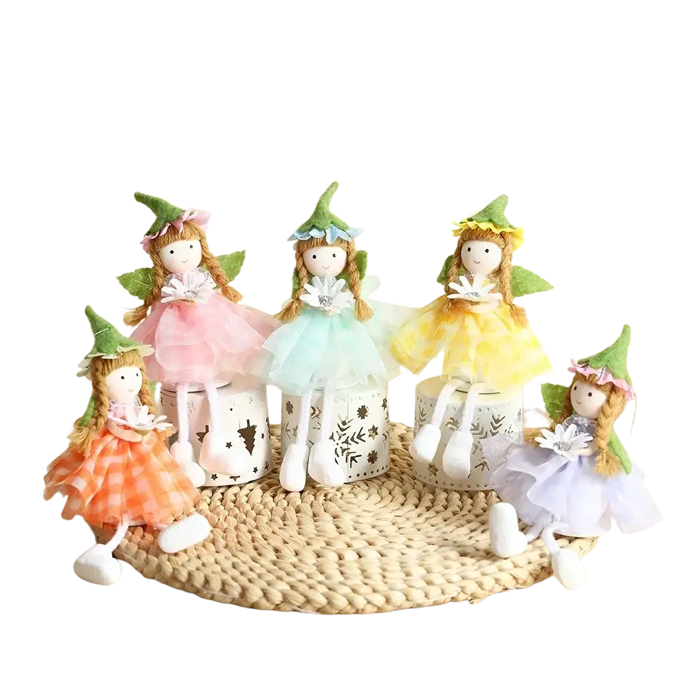 Five whimsical fairy hanging ornaments with green pointed hats and pastel fabric dresses seated on decorative bases