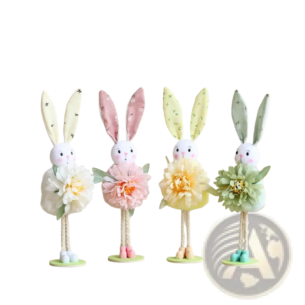 Four pastel-colored fabric easter bunny fairy hanging ornaments with embroidered ears and layered paper flower skirts
