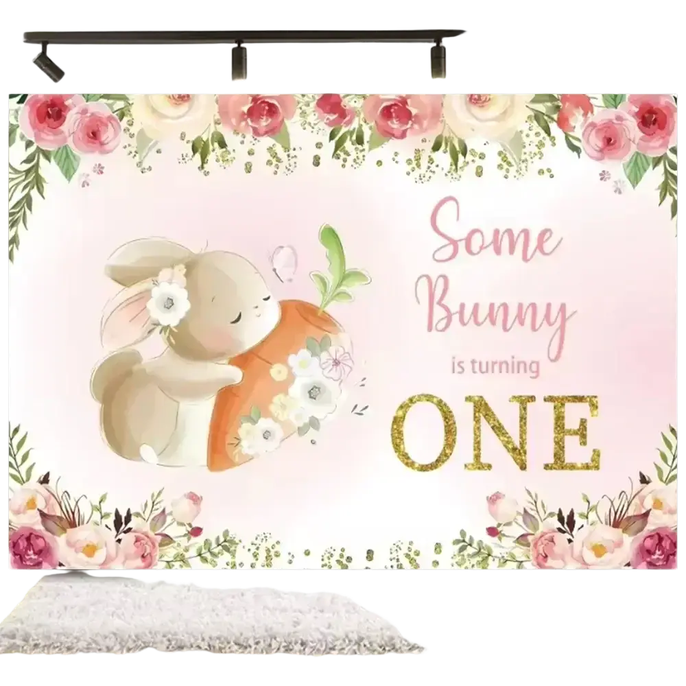 Pink floral-themed easter bunny floral photography backdrop with beige bunny hugging carrot and gold glitter text for baby shower