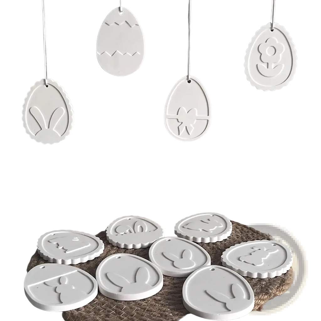 White ceramic easter egg ornaments with embossed bunny flower and ribbon designs for easter bunny silicone resin pendant mold