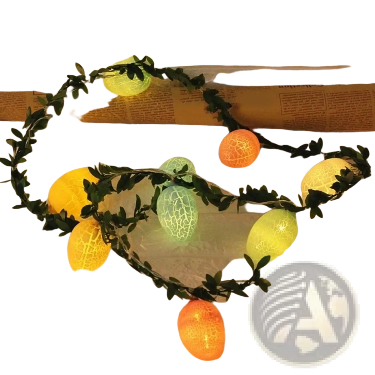 String of colorful crackled plastic egg-shaped led lights nestled in green leafy garland for easter decoration