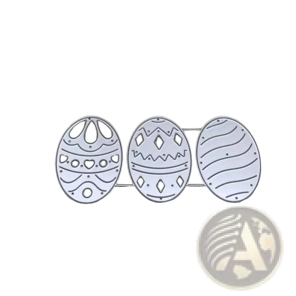 Set of three silver metal easter egg-shaped die-cutters with intricate patterns for card making