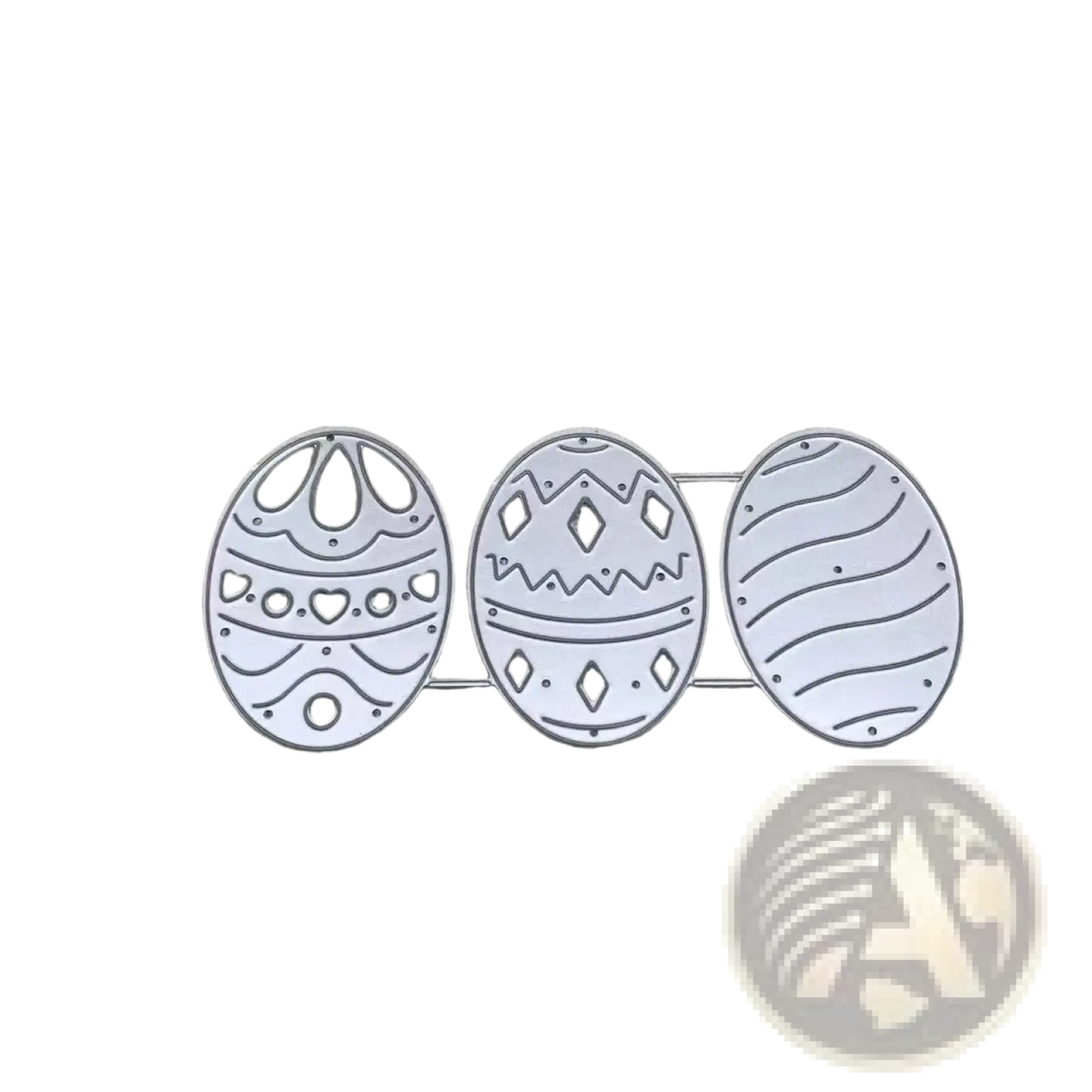 Set of three silver metal easter egg-shaped die-cutters with intricate patterns for card making