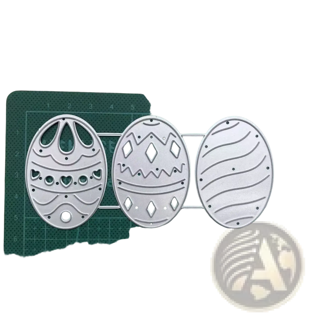 Set of three silver metal easter egg cutting dies with intricate patterns for card making and decoration