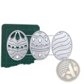 Set of three silver metal easter egg cutting dies with intricate patterns for card making and decoration