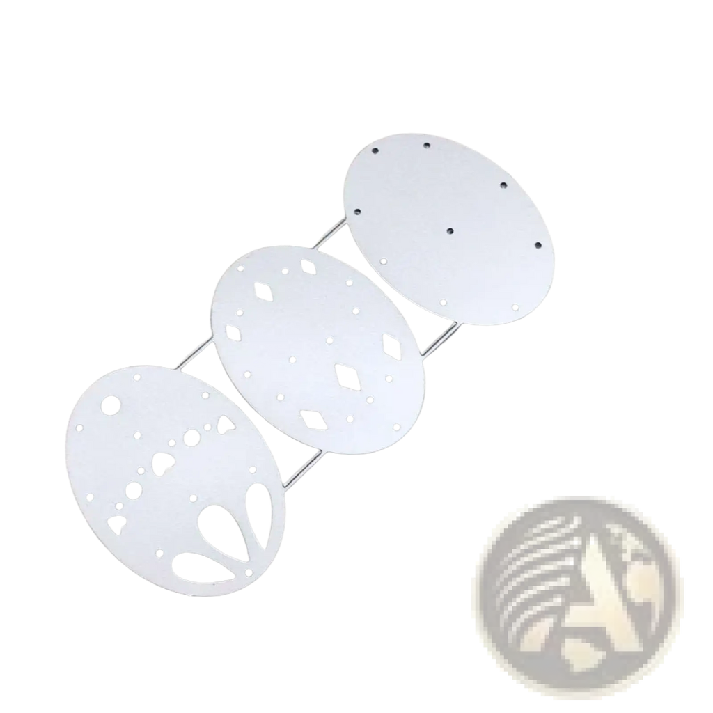 White metal easter egg-shaped die-cutting template with intricate cut-out patterns and pre-drilled holes for card making