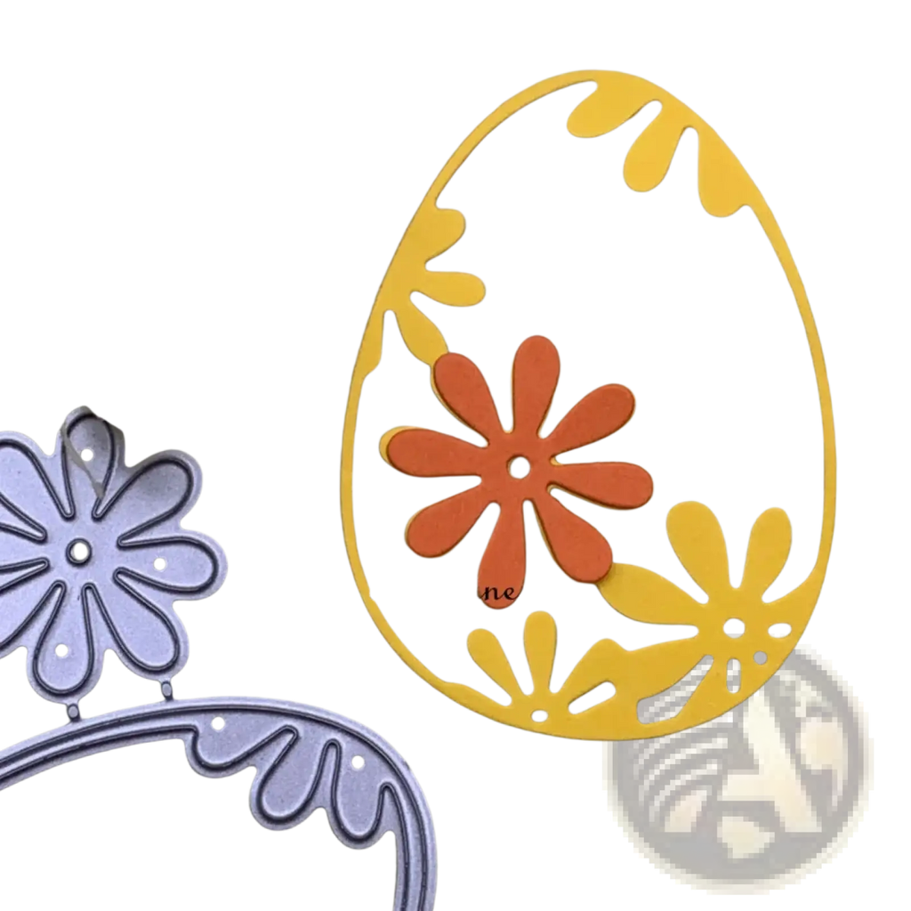Yellow easter egg metal cutting die with orange and yellow floral cutouts and scalloped edge for scrapbook stencil